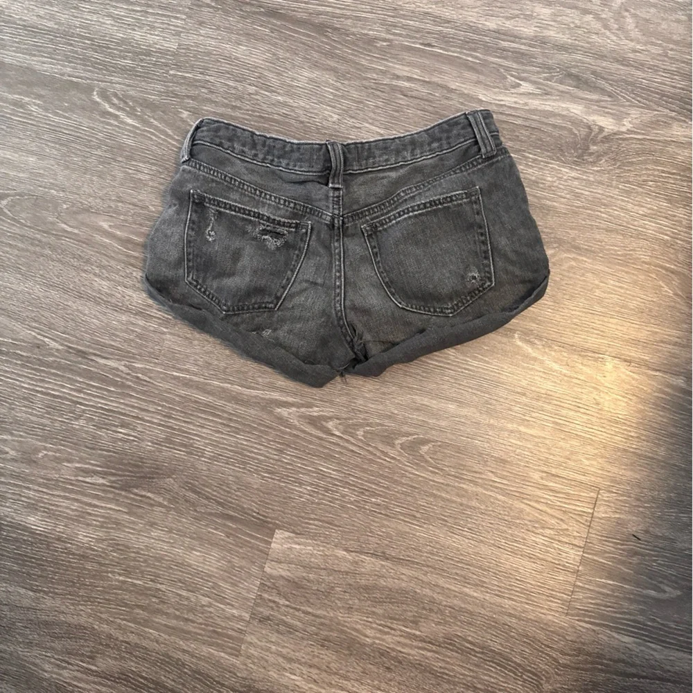 Free People Romeo rolled Black Distressed Denim Cutoff Shorts size 26